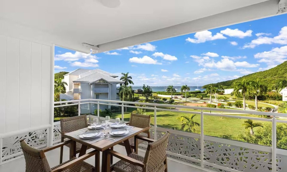 Anse Marcel Hotel | Oceanfront Comfort: Relax in a Roomy Suite with Kitchen Overlooking Anse Marcel