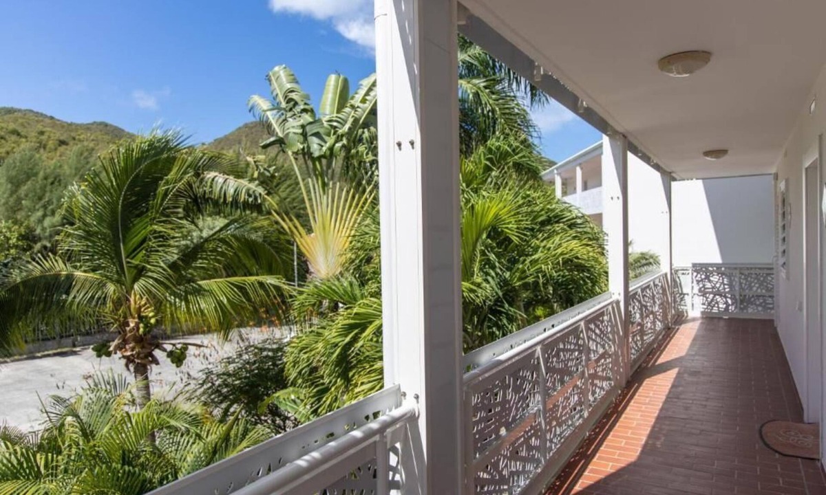 Anse Marcel Hotel | Relaxing Garden View Suite with Full Kitchen Steps Away from Anse Marcel Beach