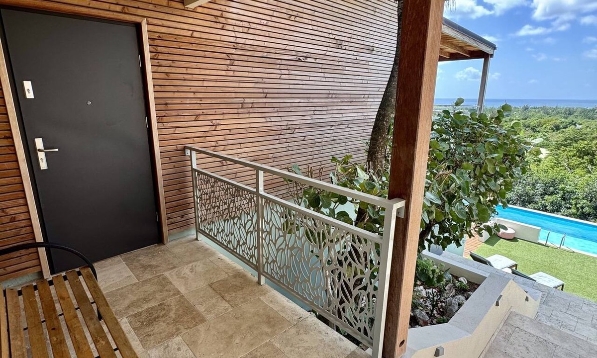 Plum Bay Condo | Starfruit Condo with ocean view in Kombawa Domaine