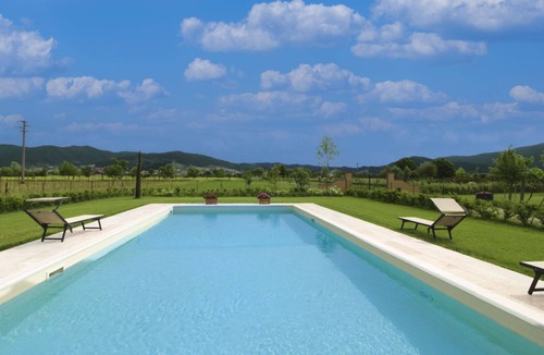 Le Piazze Villa | Typical Tuscan house with private and fenced swimming pool. View on the village of Castiglion Fioren