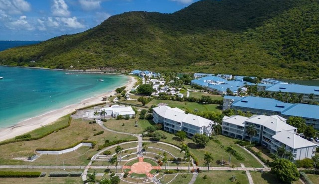 Anse Marcel Beachfront Getaway: Stylish Suite with Kitchen and Living Area