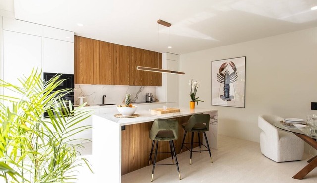 Aura | 1BR Loft Residence – Garden View (V3)