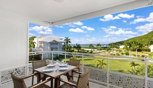 Oceanfront Comfort: Relax in a Roomy Suite with Kitchen Overlooking Anse Marcel