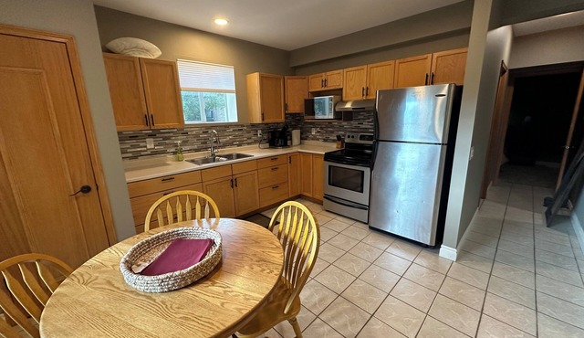 Separate sunny walk out basement suite in safe upscale neighborhood. Pets ok/fee in Calgary
